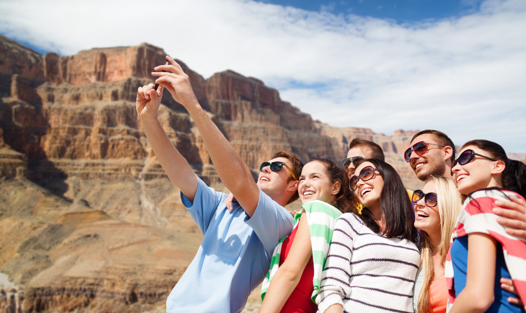Group of friends taking a selfie on vacation